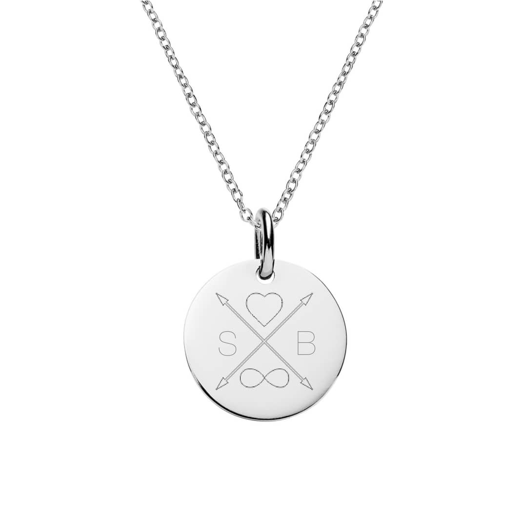 heart and infinity symbols and couples initials between crossed arrows engraved