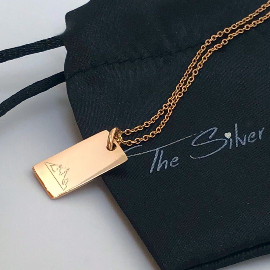 rose gold bar necklace with mountain symbol engraved