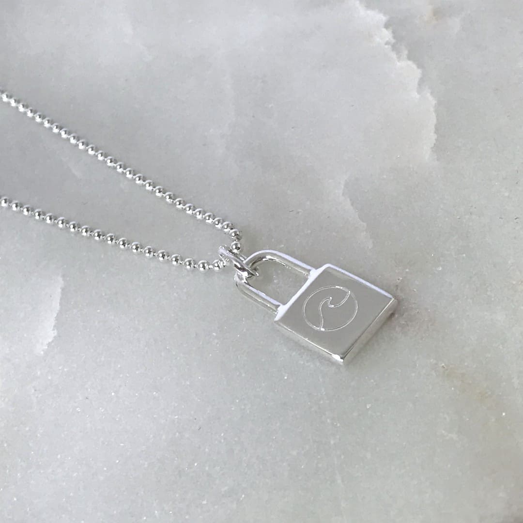 lock necklace with wave, beach symbol engraved
