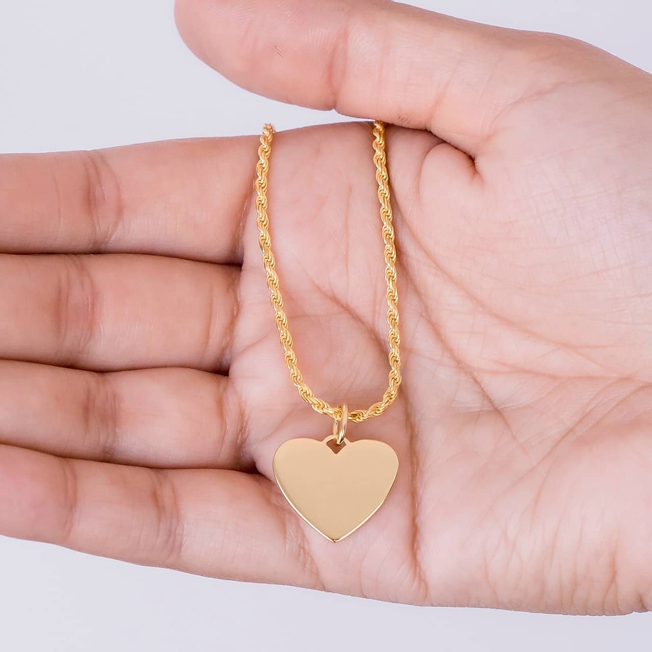 engraved jewellery - yellow gold rope bracelet with heart that can be engraved